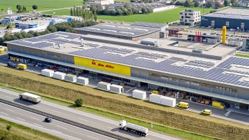 Green Factory Alois Müller: 200.000 Solarzellen für E-Auto-Flotte