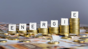 Symbolbild Energiepreise Geld mit Wort ENERGIE
